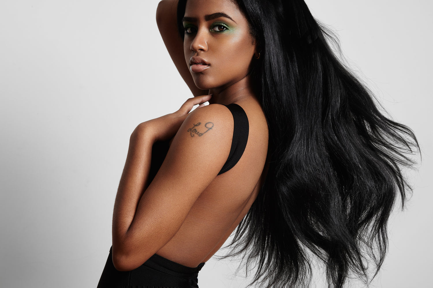 Model with Human Hair Extensions